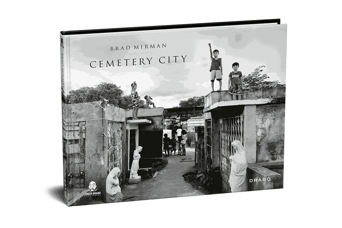 Cemetery City book cover by Brad Mirman showing black and white photo of children in Manila cemetery community