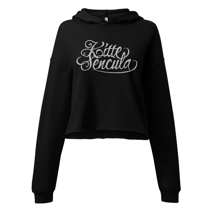 Black Kittesencula Crop Hoodie with raw hem and drawstrings, featuring white script logo on front