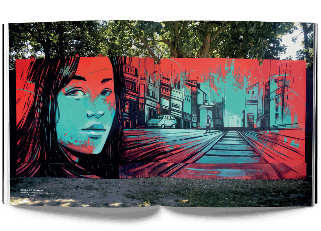 Alice Pasquini Crossroads mural artwork featuring a woman's face and urban cityscape in vibrant red and blue tones