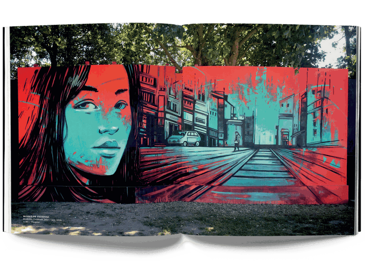 Alice Pasquini Crossroads mural artwork featuring a woman's face and urban cityscape in vibrant red and blue tones