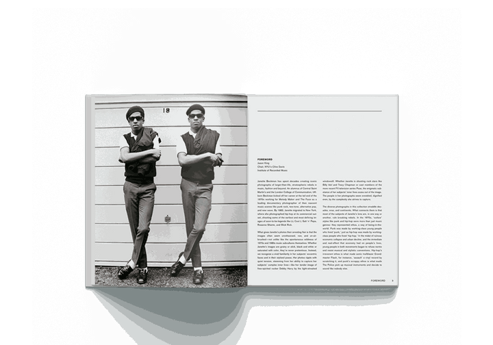 Janette Beckman Rebels From Punk to Dior first edition photography book open to black and white image of two men crossing arms and text on right page