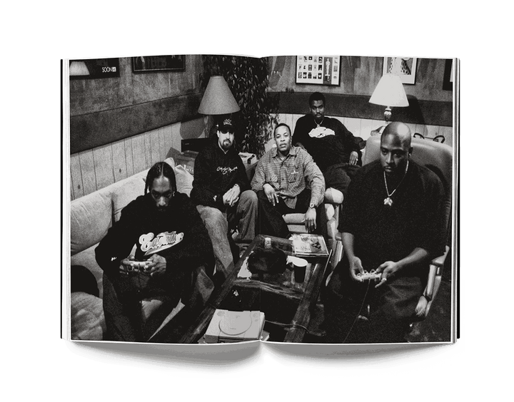 Estevan Oriol black and white photo of five men sitting indoors featured in This is Los Angeles book