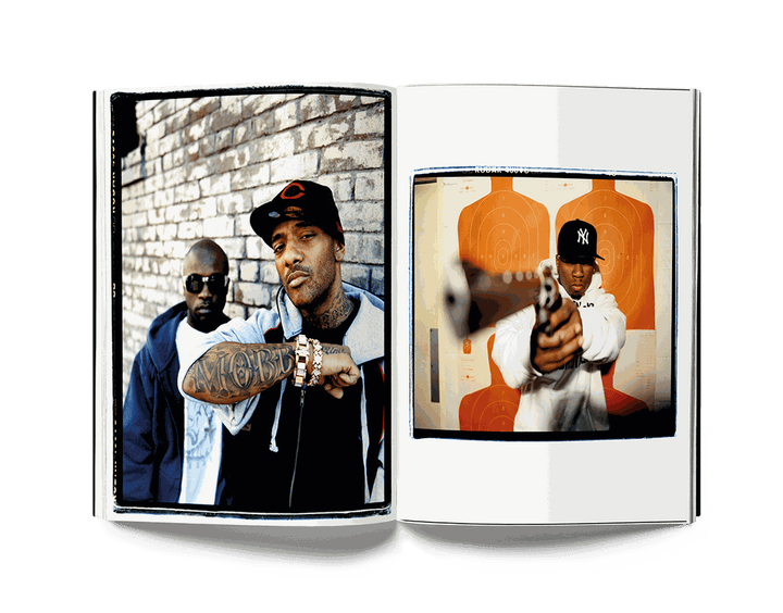 Open book featuring Estevan Oriol's street photography portraits of two men, one aiming a gun at a target, showcasing urban Los Angeles culture.